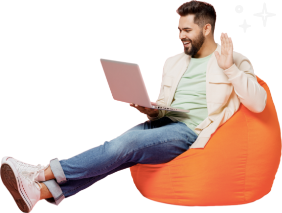 Homme assis avec un ordinateur portable